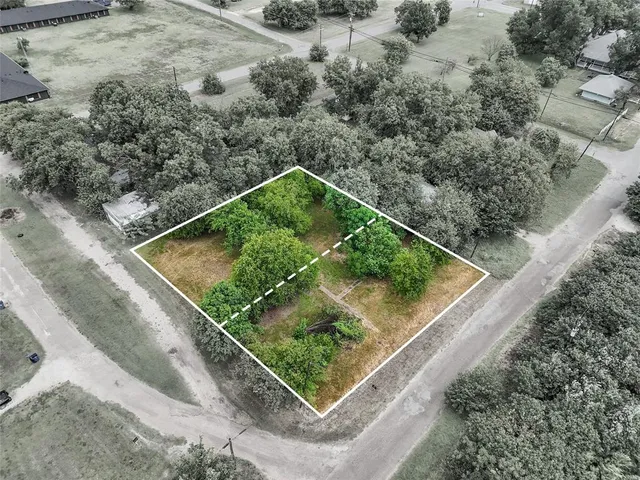 a view of a backyard of a house