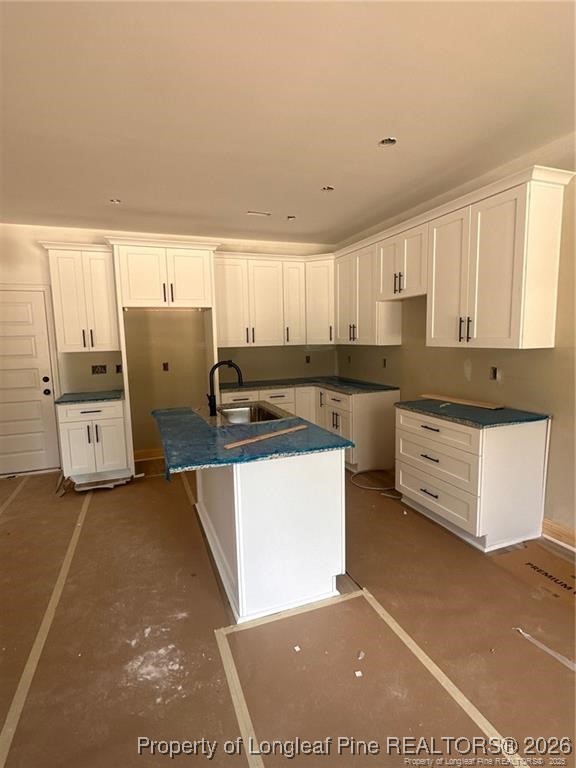 151 Merle Road Pinebluff, NC 28373 - Photo 3 of 6 a kitchen with stainless steel appliances granite countertop a stove a sink and a refrigerator