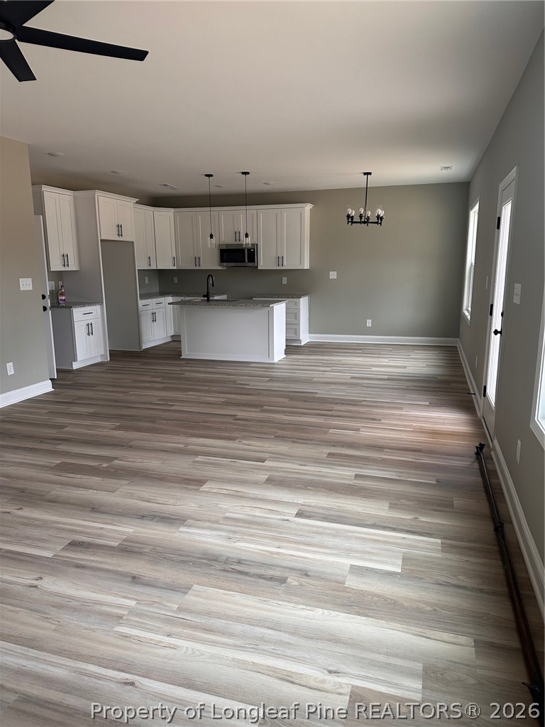 151 Merle Road Pinebluff, NC 28373 - Photo 5 of 12 a view of kitchen and empty room