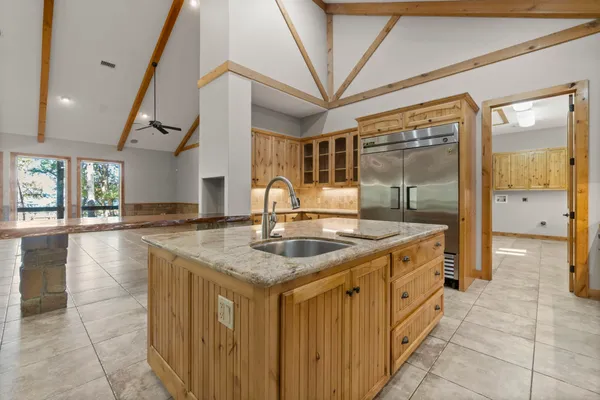a view of an empty room with empty shelves