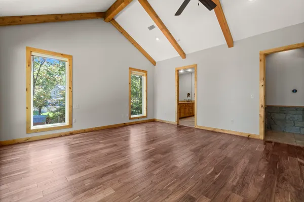 a bathroom with a glass shower door