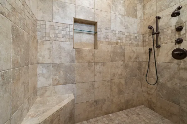 a living room with furniture a table and chairs