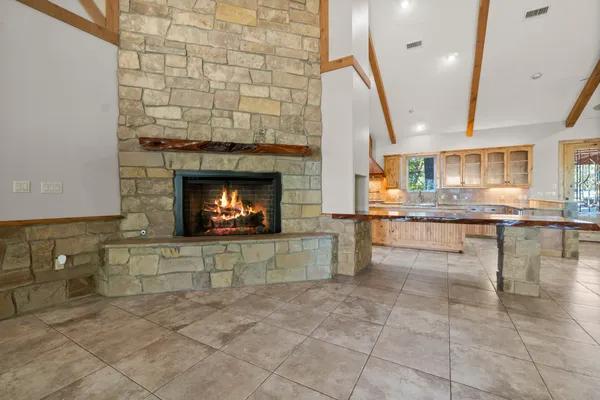 a kitchen with stainless steel appliances granite countertop a stove and a sink