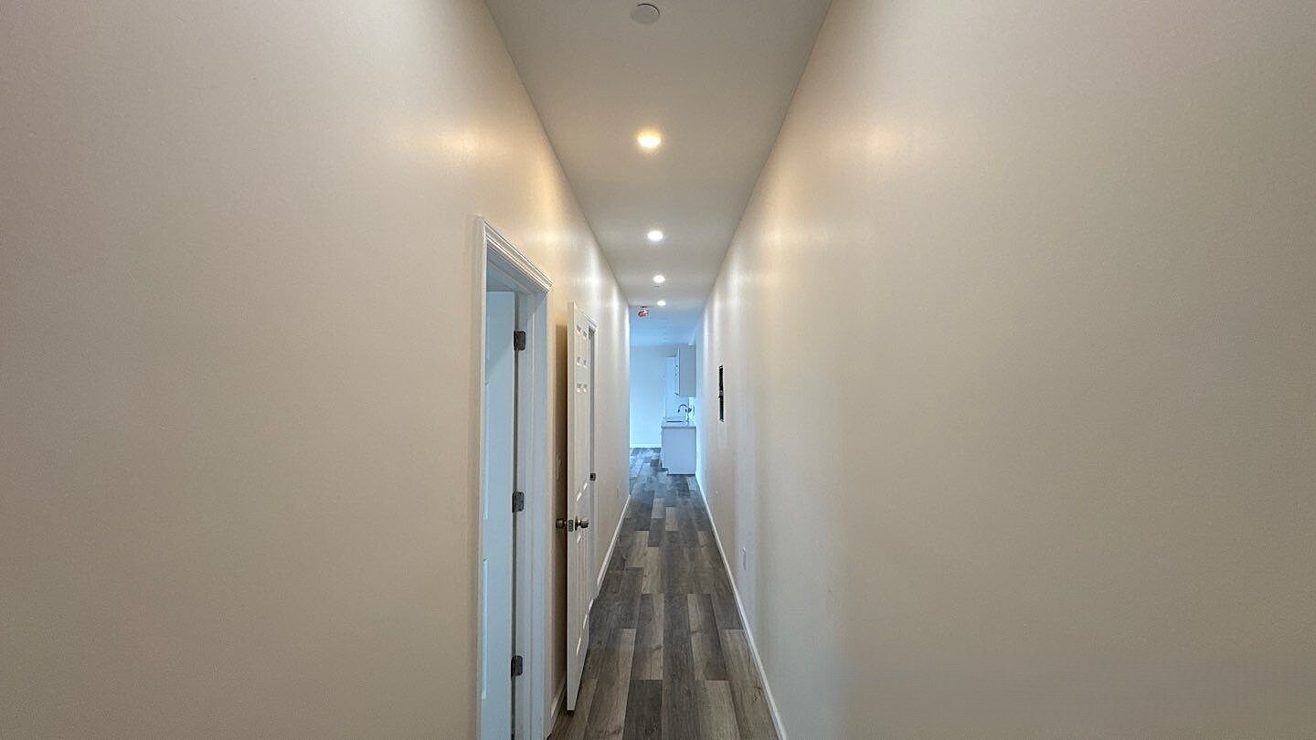 830 Hendrix Street Brooklyn, NY 11207 - Photo 16 of 25 a view of a hallway