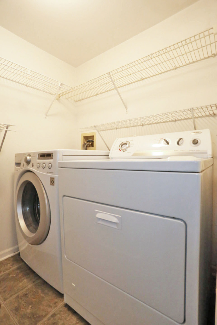 620 Cobblestone Court, Unit 620 Elgin, IL 60120 - Photo 13 of 25 a close up view of washer and dryer