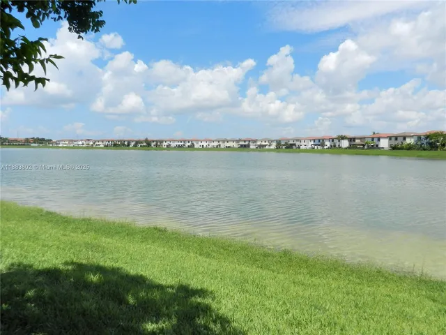 a view of a lake from a yard