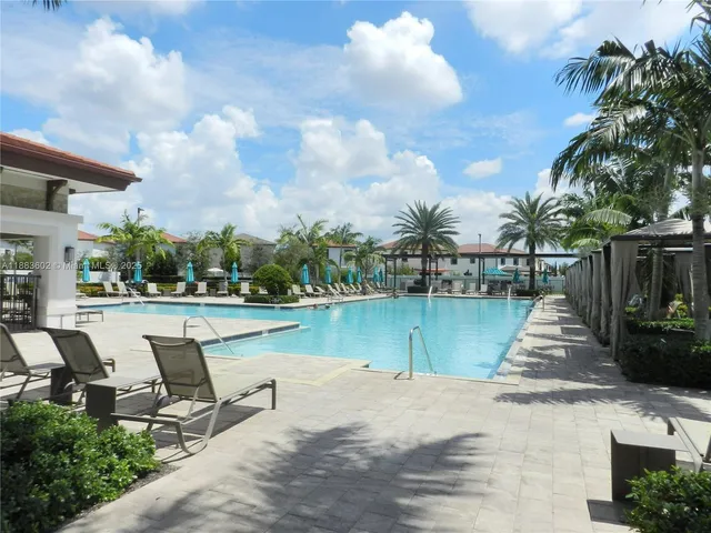 a view of a lake with sitting area