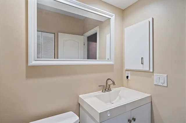 a bathroom with a sink and a toilet