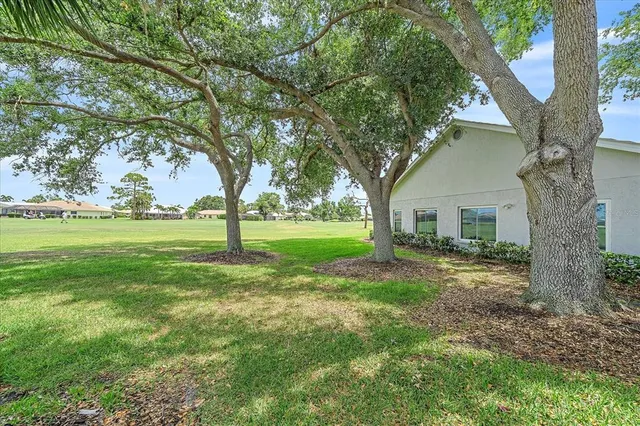 a view of a yard in front of the house