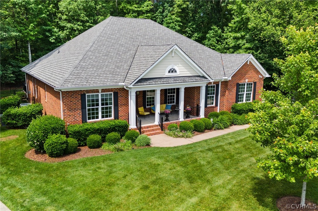 168 Button Bush Road Richmond, VA 23238 - Photo 1 of 42 a front view of a house with a yard