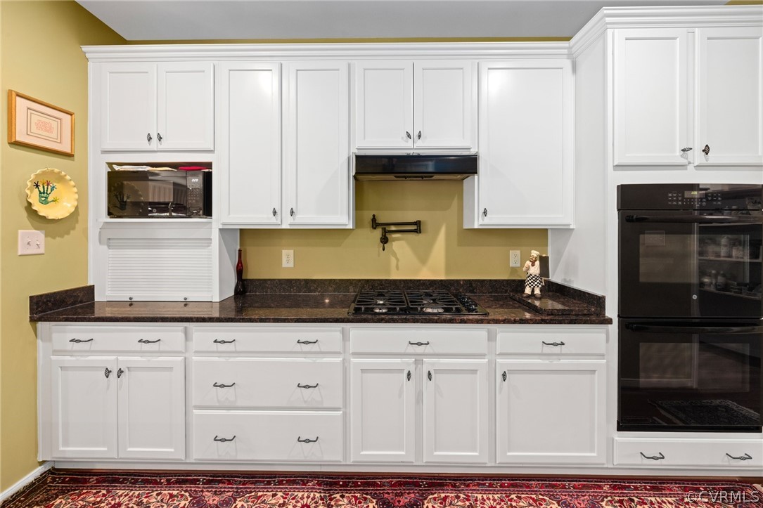 168 Button Bush Road Richmond, VA 23238 - Photo 11 of 42 a kitchen with granite countertop white cabinets and sink