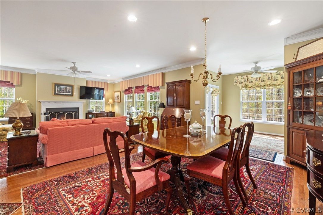 168 Button Bush Road Richmond, VA 23238 - Photo 15 of 42 a dining room with furniture window and wooden floor