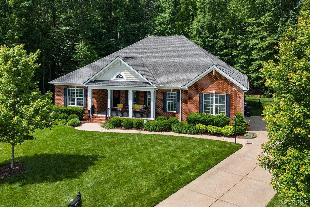 168 Button Bush Road Richmond, VA 23238 - Photo 2 of 42 a front view of a house with a yard