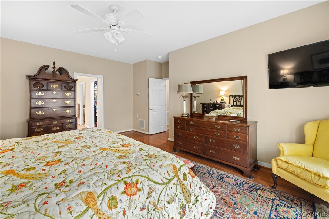 168 Button Bush Road Richmond, VA 23238 - Photo 23 of 42 a bed room with a bed a television and dresser