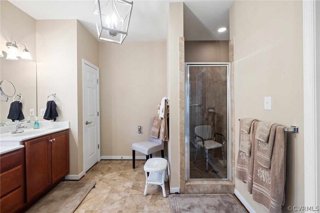 168 Button Bush Road Richmond, VA 23238 - Photo 24 of 42 a bathroom with a sink a toilet and shower