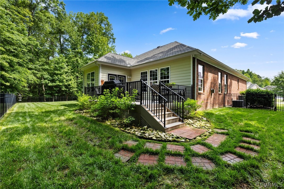 168 Button Bush Road Richmond, VA 23238 - Photo 35 of 42 a view of a house with a yard and plants