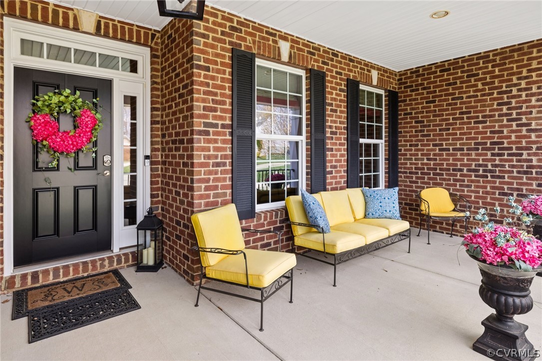 168 Button Bush Road Richmond, VA 23238 - Photo 4 of 42 a building outdoor space with patio furniture