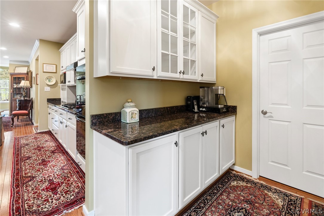 168 Button Bush Road Richmond, VA 23238 - Photo 8 of 42 a kitchen with stainless steel appliances granite countertop a sink and cabinets