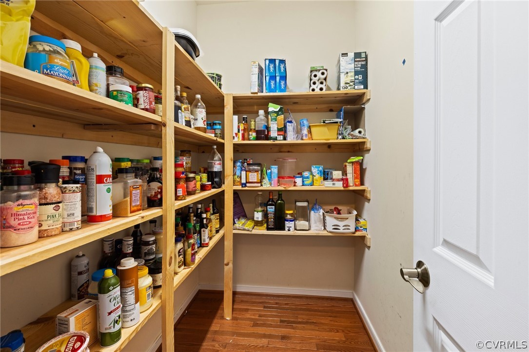 168 Button Bush Road Richmond, VA 23238 - Photo 9 of 42 a room with lots of bottles of alcohol