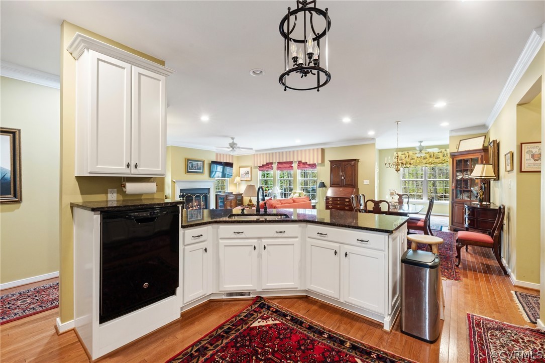 168 Button Bush Road Richmond, VA 23238 - Photo 10 of 42 a kitchen with a sink appliances cabinets and furniture