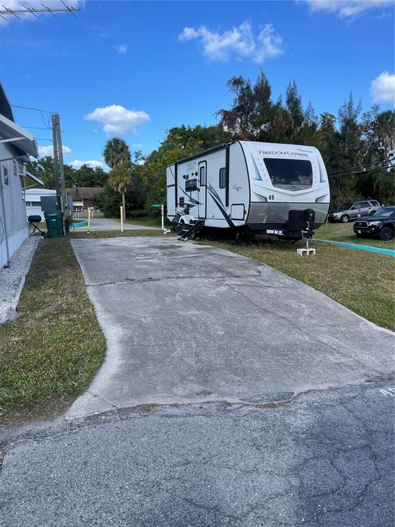 a view of a house with a back yard
