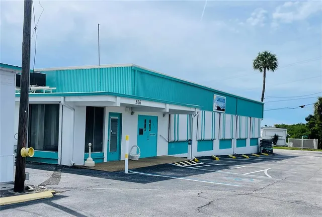 a house view with a street sign