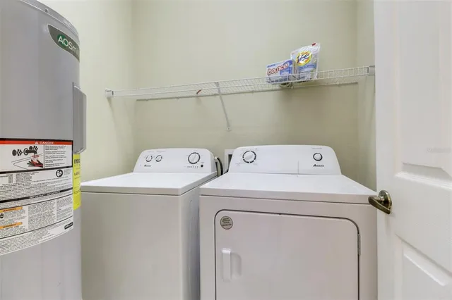 a utility room with dryer and washer