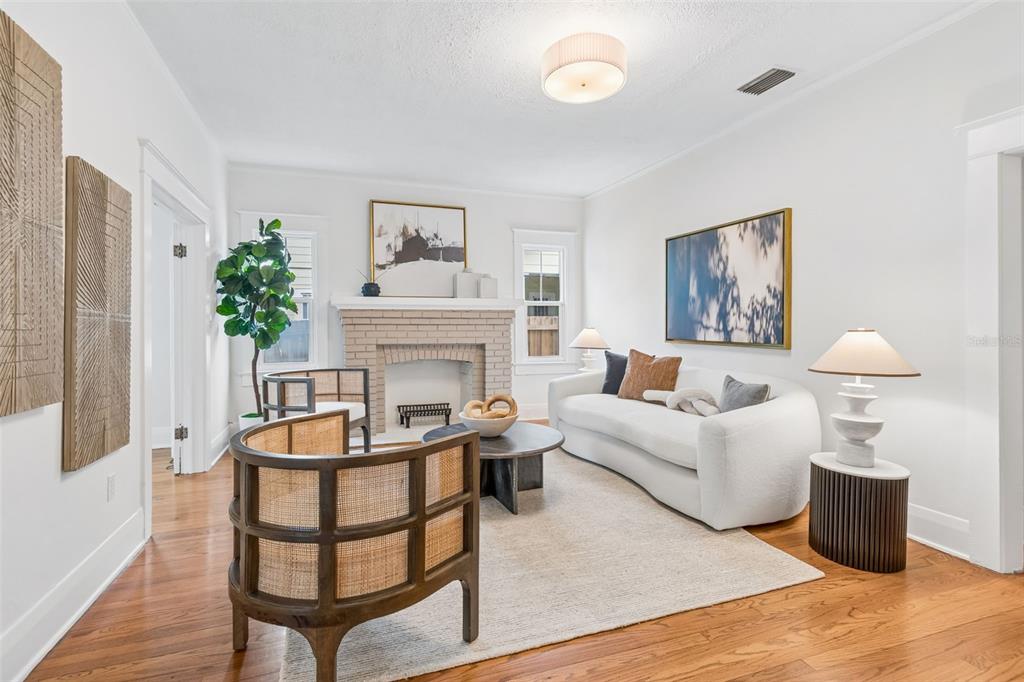 2434 West Prospect Road Tampa, FL 33629 - Photo 12 of 45 a living room with furniture and a fireplace