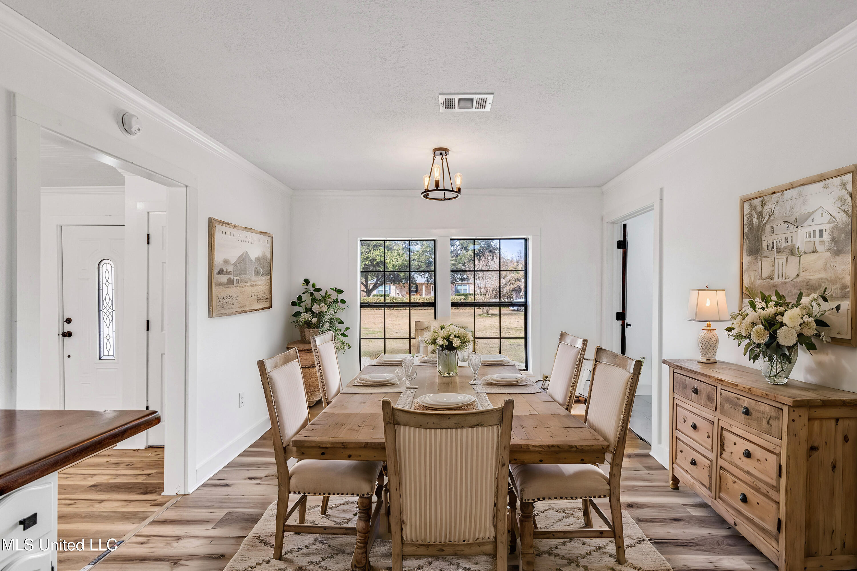 22149 Episcopal School Road Long Beach, MS 39560 - Photo 11 of 63 Digitally staged dining room