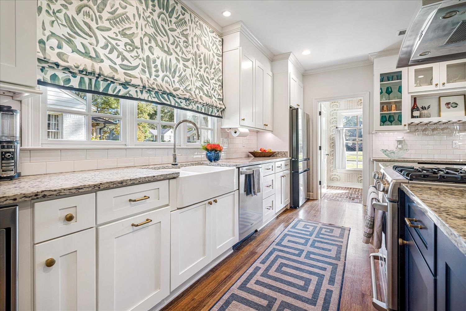 3682 Oakley Avenue Memphis, TN 38111 - Photo 15 of 34 a kitchen with cabinets appliances and a counter space
