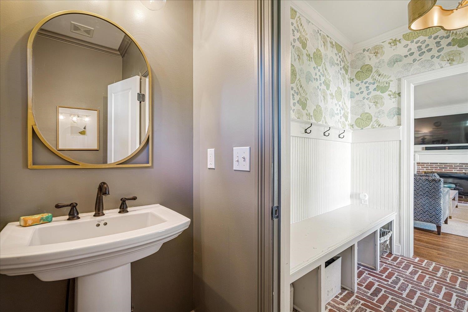 3682 Oakley Avenue Memphis, TN 38111 - Photo 18 of 34 a bathroom with a sink a mirror and a shower