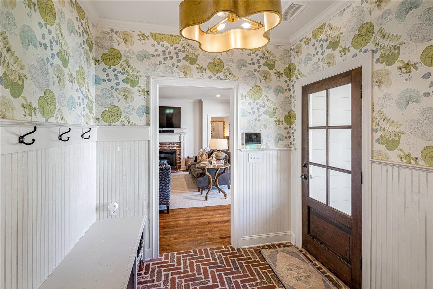 3682 Oakley Avenue Memphis, TN 38111 - Photo 19 of 34 a view of a livingroom with a dinning area hardwood floor and a ceiling fan