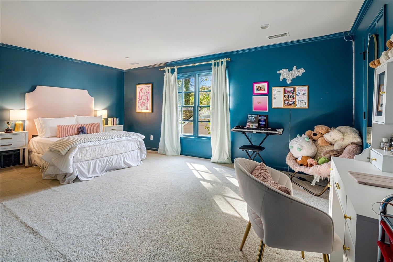 3682 Oakley Avenue Memphis, TN 38111 - Photo 29 of 34 a bedroom with bed and a dresser with mirror