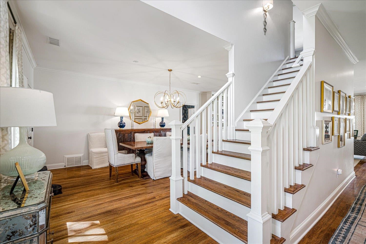 3682 Oakley Avenue Memphis, TN 38111 - Photo 6 of 34 a view of a hallway with wooden floor and workspace