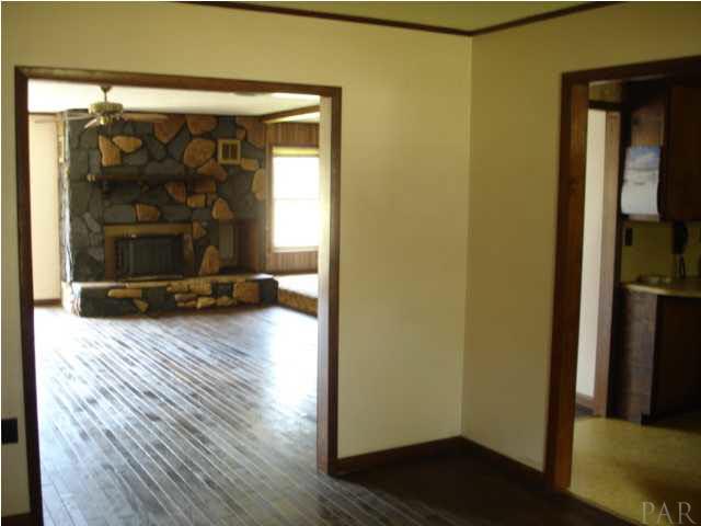 1085 Tate Road Cantonment, FL 32533 - Photo 5 of 19 Formal Dining Room adjoins kitchen and great room.