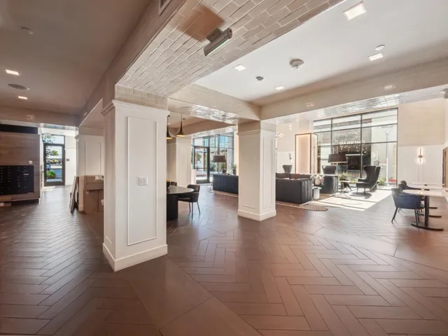 a view of a living room and dining room