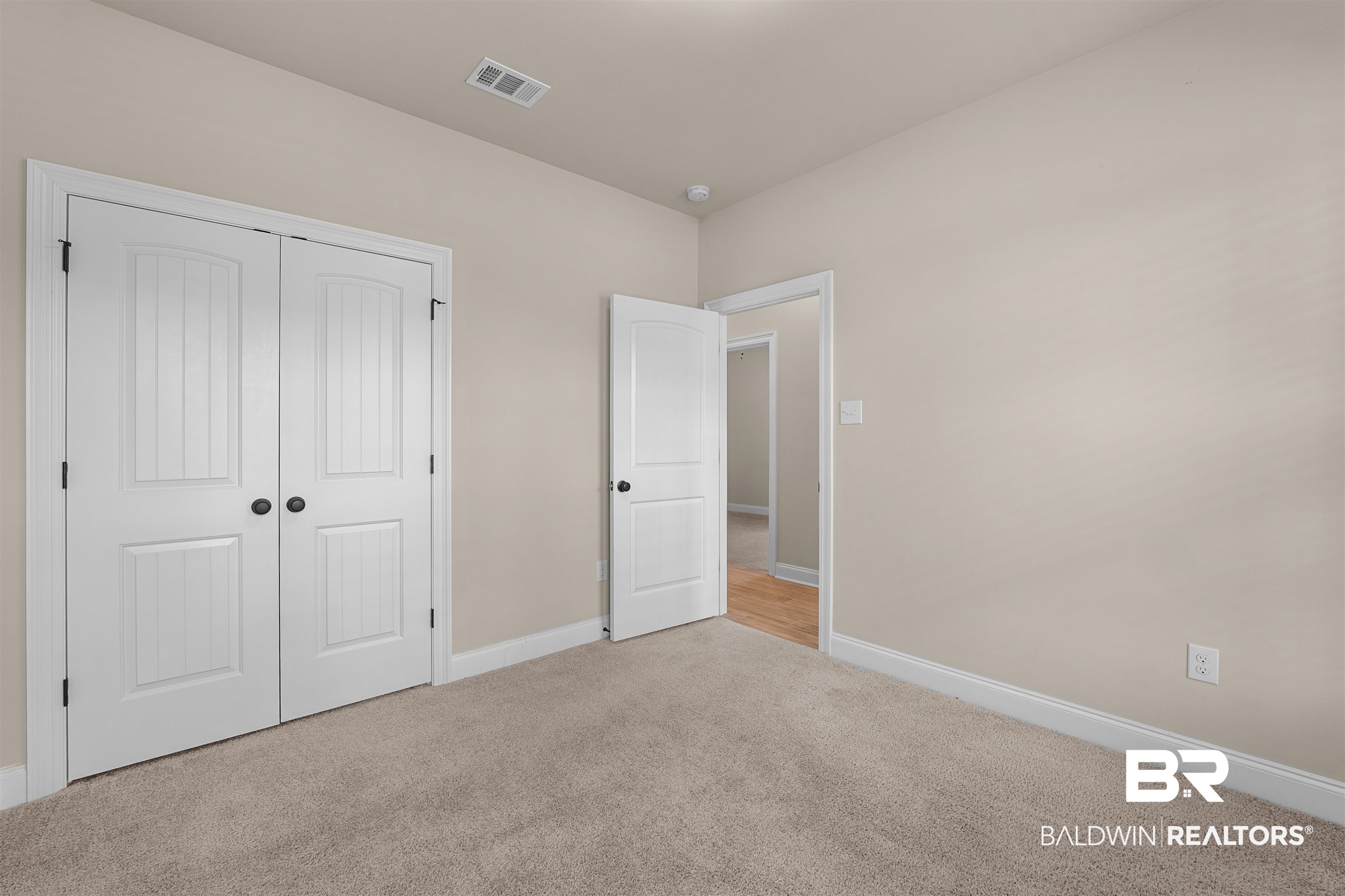 991 Dalton Circle Foley, AL 36535 - Photo 13 of 35 Unfurnished bedroom with carpet and a closet