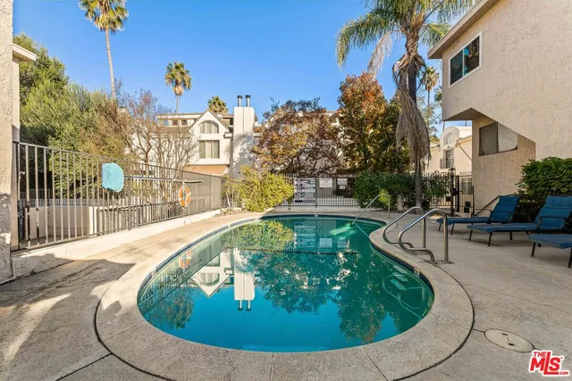 a view of a house with a swimming pool