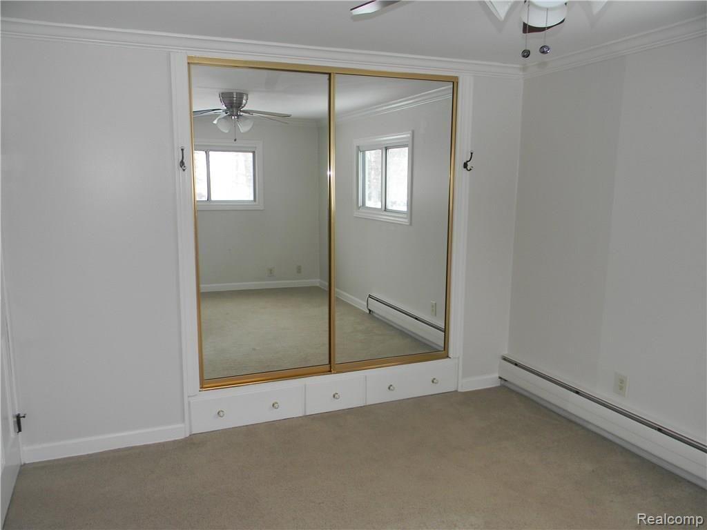 4391 North Gale Road Davison, MI 48423 - Photo 32 of 41 Built-in storage/sliding pane-mirror closet door