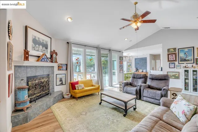 a kitchen with white cabinets and sink
