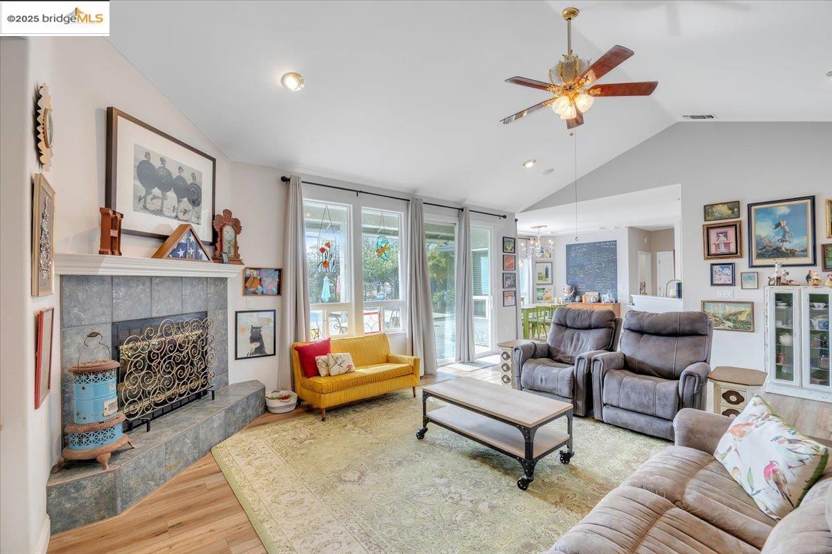 10200 Bell Mooney Road Jamestown, CA 95327 - Photo 13 of 60 a living room with furniture and a fireplace