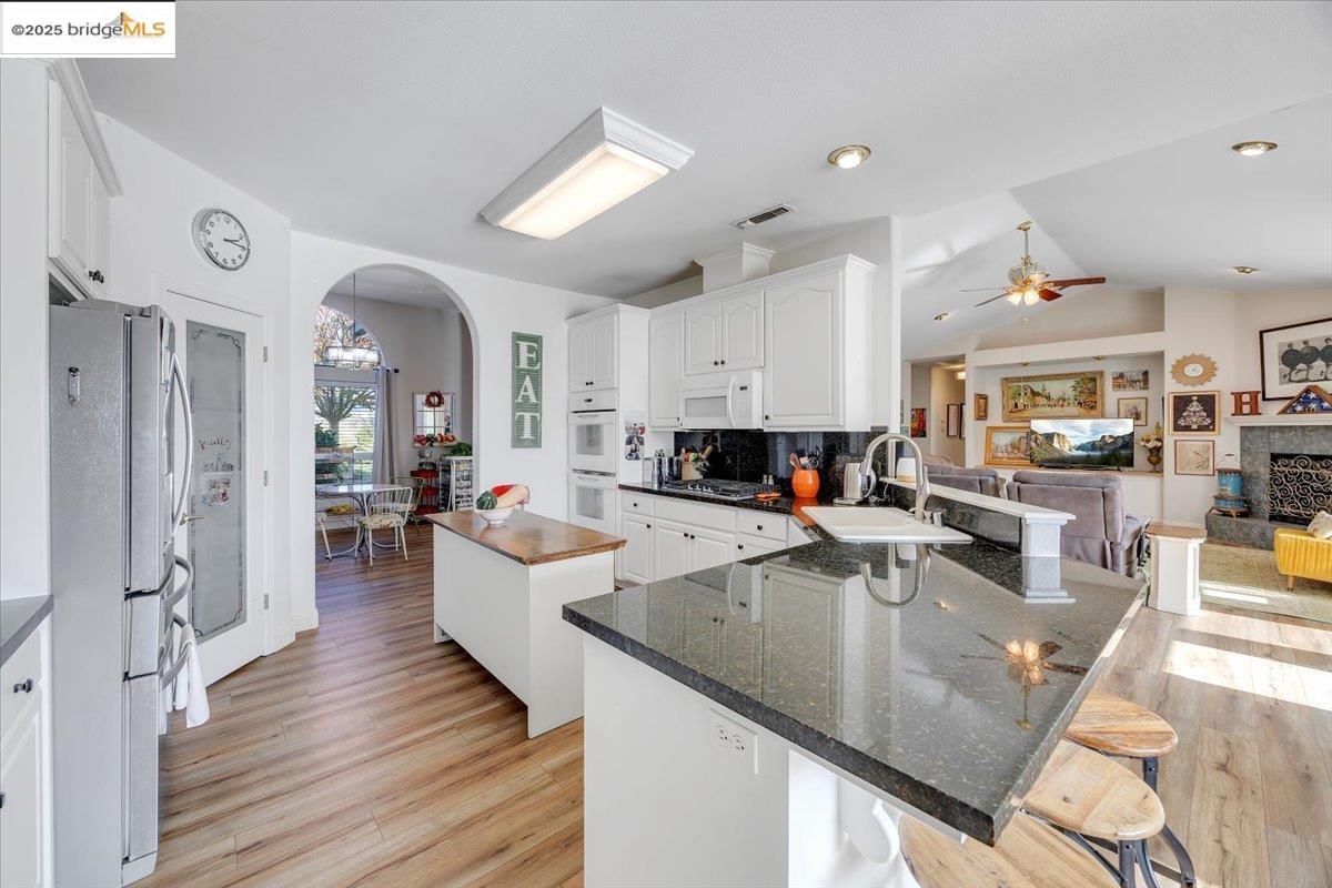 10200 Bell Mooney Road Jamestown, CA 95327 - Photo 21 of 60 a large kitchen with a lot of counter space