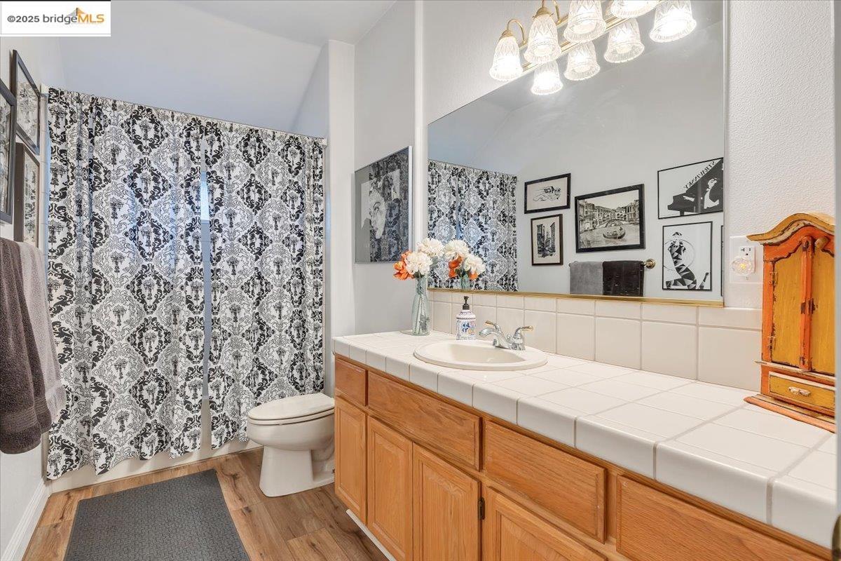 10200 Bell Mooney Road Jamestown, CA 95327 - Photo 33 of 60 a bathroom with a sink toilet and shower