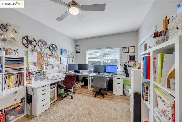 a view of backyard with outdoor seating and green space