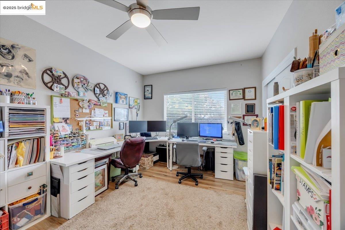 10200 Bell Mooney Road Jamestown, CA 95327 - Photo 35 of 60 a view of a workspace with furniture and a window