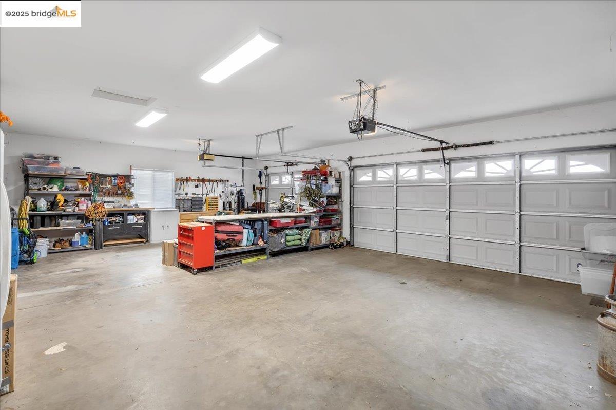 10200 Bell Mooney Road Jamestown, CA 95327 - Photo 46 of 60 a view of a garage with storage