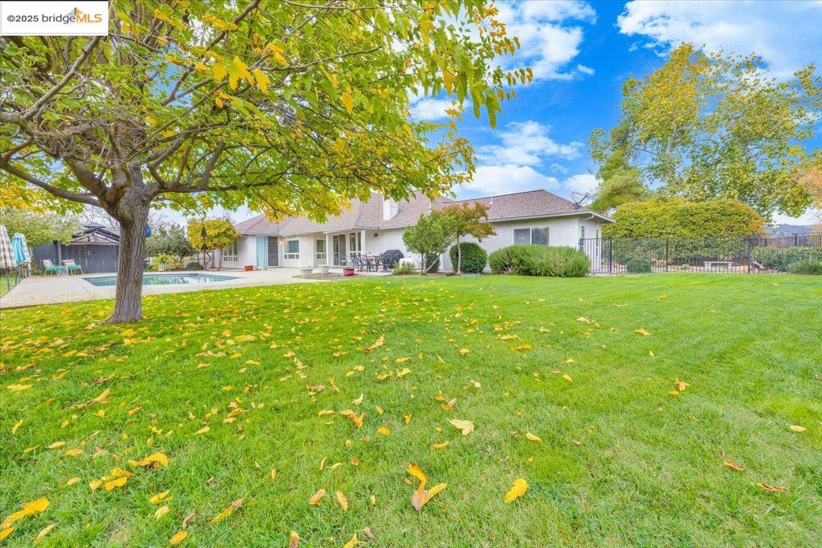 10200 Bell Mooney Road Jamestown, CA 95327 - Photo 54 of 60 a view of a house with a yard