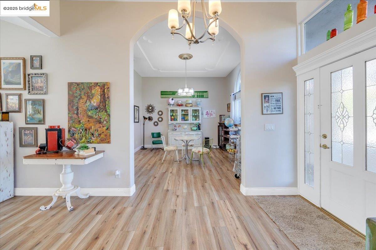 10200 Bell Mooney Road Jamestown, CA 95327 - Photo 8 of 60 a view of a livingroom with wooden floor and furniture
