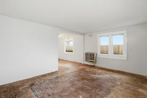 an empty room with windows