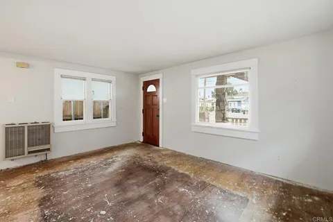 an empty room with windows